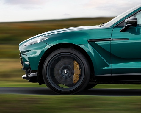 Dynamism re-defined <p>A full suite of handling modifications brings a new sense of dynamism to the DBX. Re-rated dampers and a brand-new centre console, which adds functions like ESP and suspension control, shorten the drive and allow you to exploit the car’s colossal power.</p>